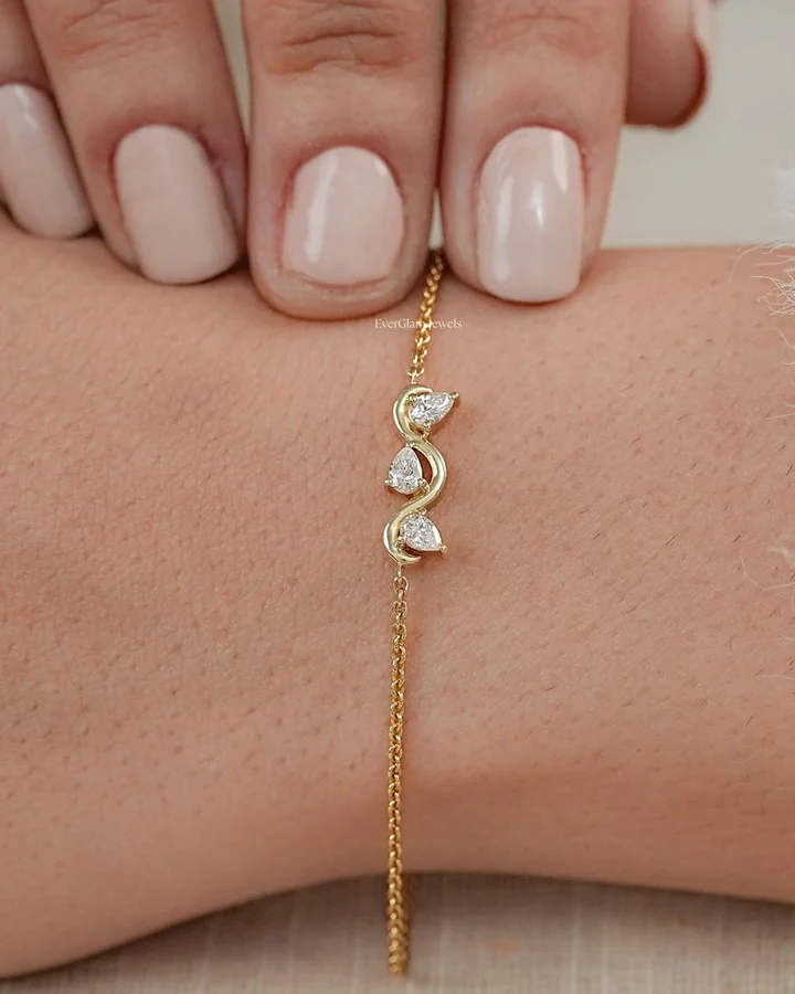Gold diamond bracelet worn on the wrist